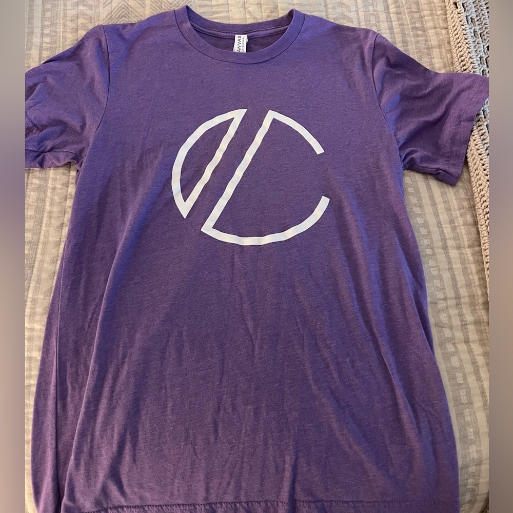 Purple graphic T-Shirt. Size medium. Never worn.